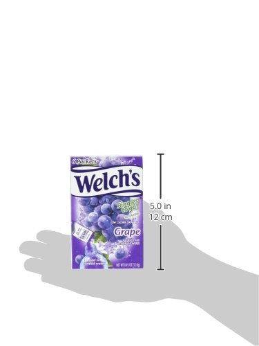 SINGLES TO GO! Welch's on a picnic table illustrating portable grape flavor for outings