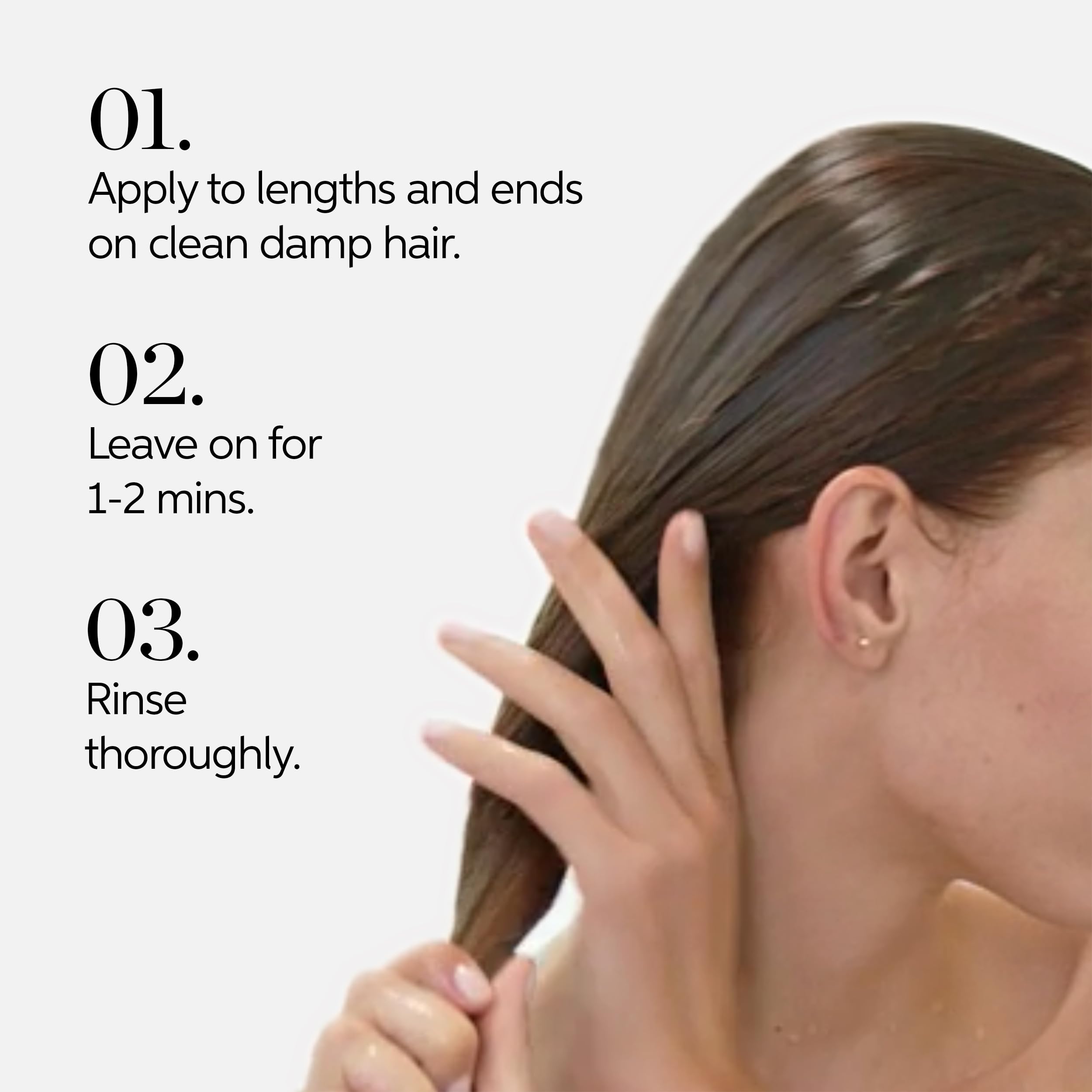 Wella Professionals bottle beside a hand showing product size