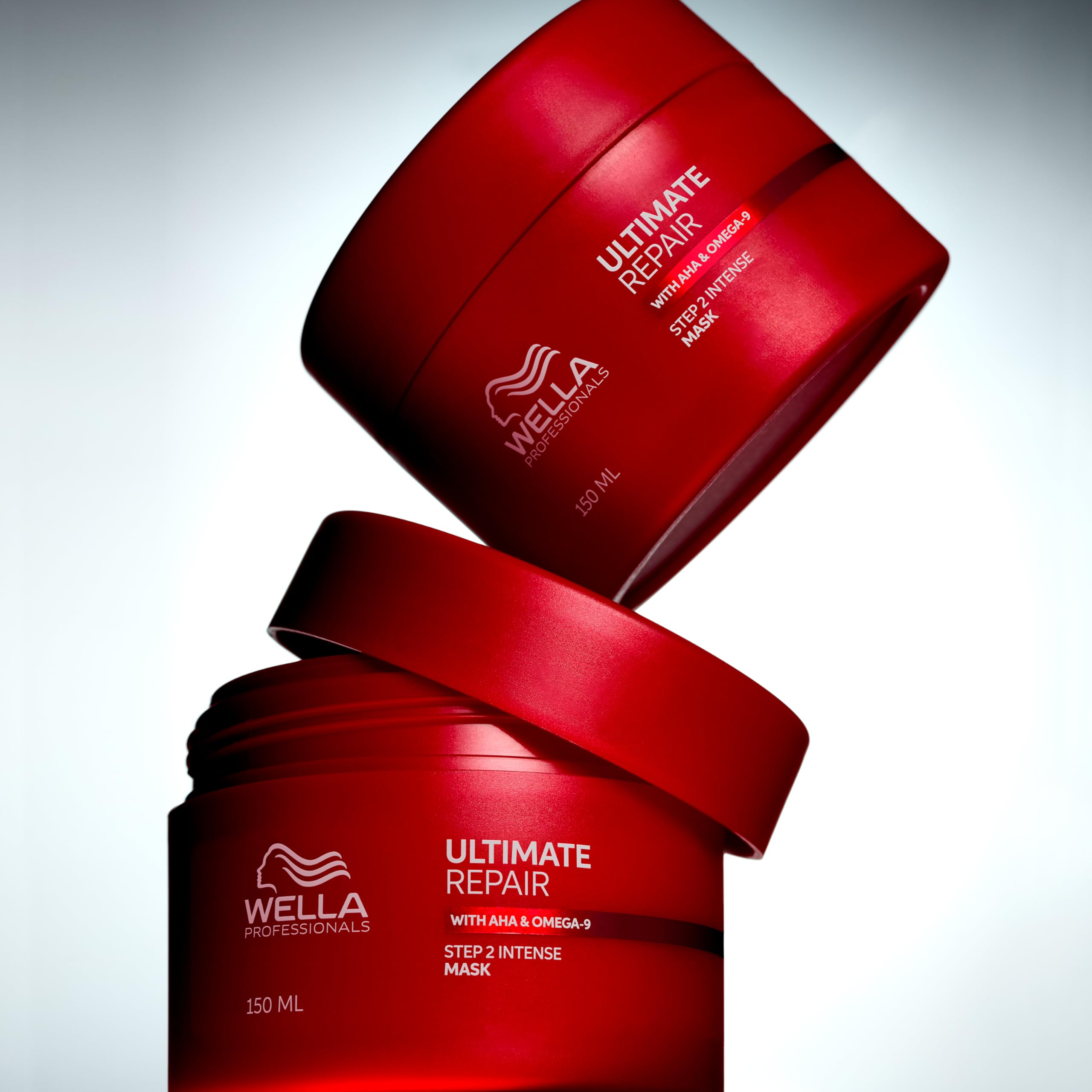 Wella Professionals jar next to hand demonstrating real product size