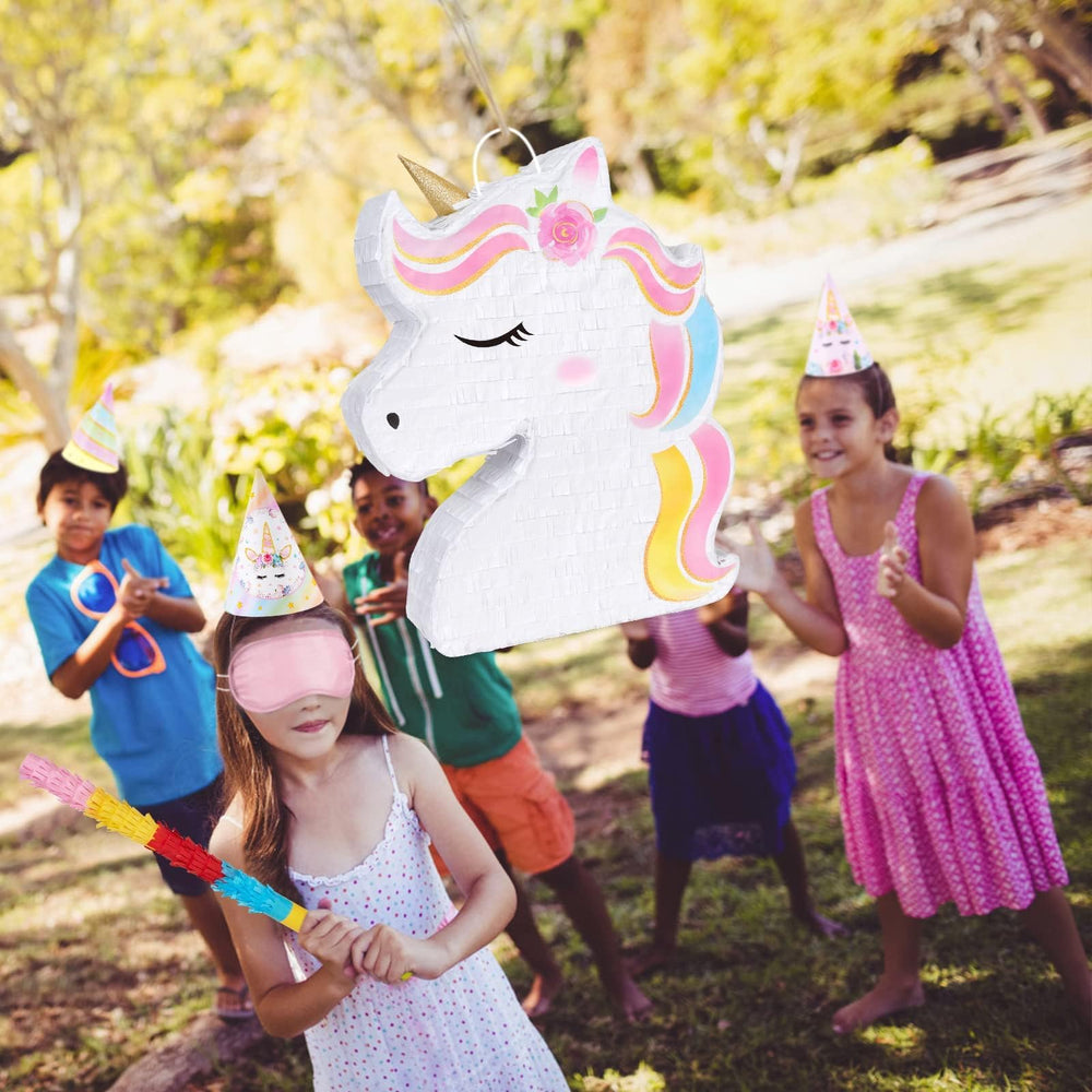WERNNSAI unicorn piñata in use with child swinging bat for playful entertainment