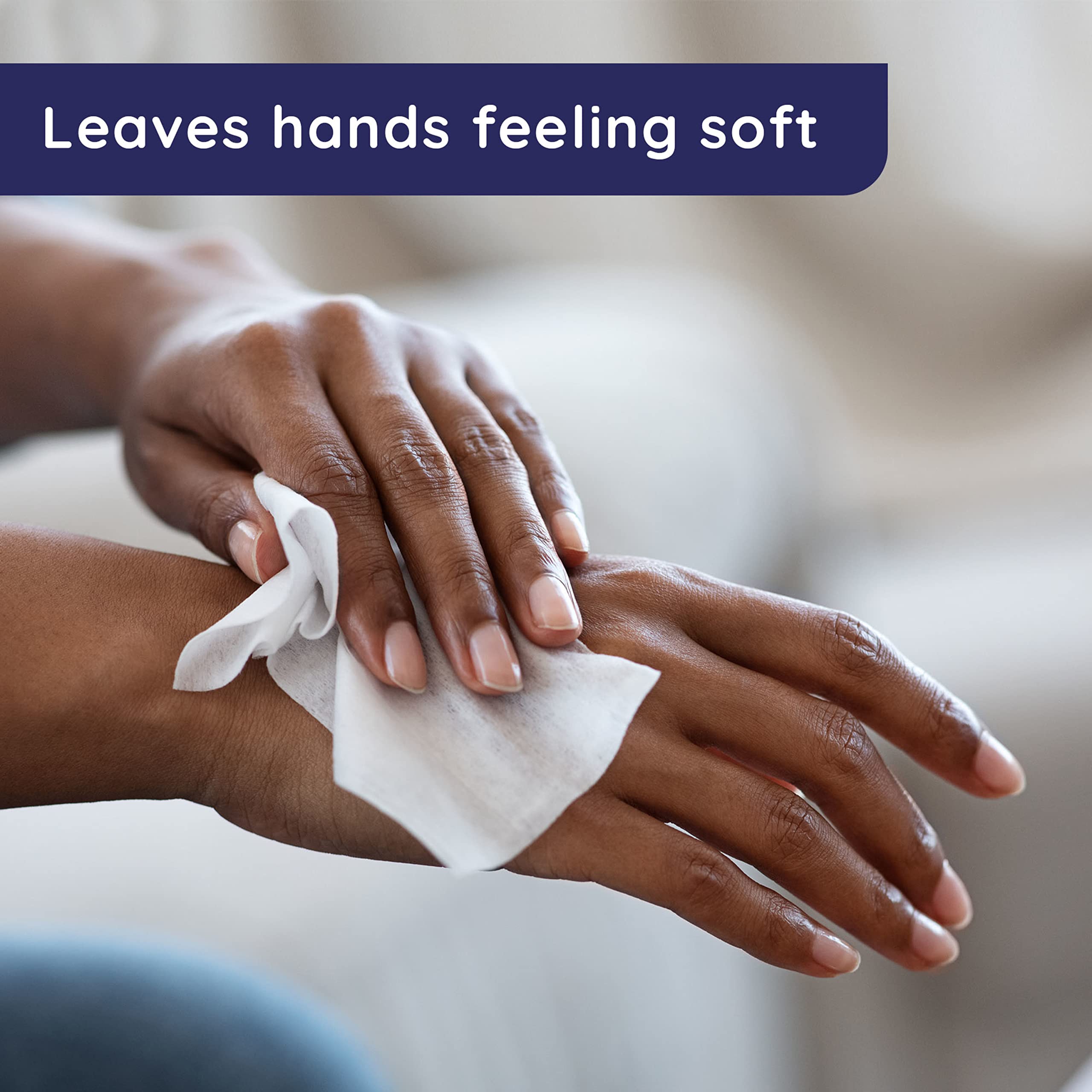 Hand using Wet Ones wipe to remove mess for quick refresh