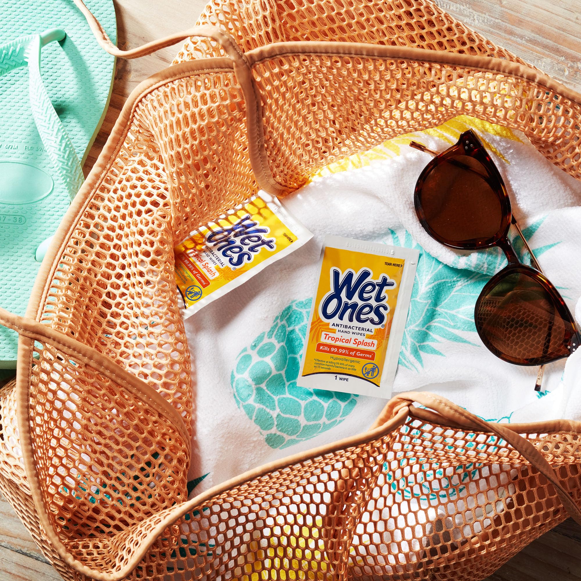 Wet Ones wipe in use on hands showing quick cleanup and smoother-feeling skin