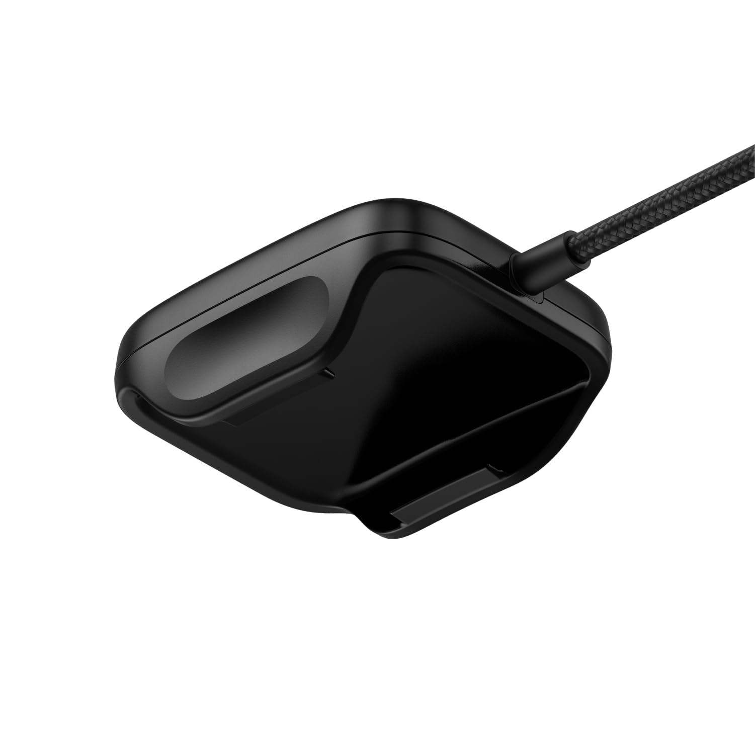 WHOOP band docked in the charger demonstrating on‑wrist charging convenience