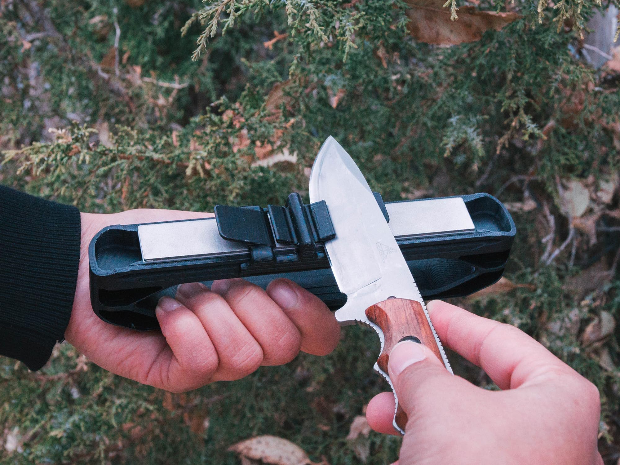 Wicked Edge Venture in use at camp sharpening a folding knife for convenience