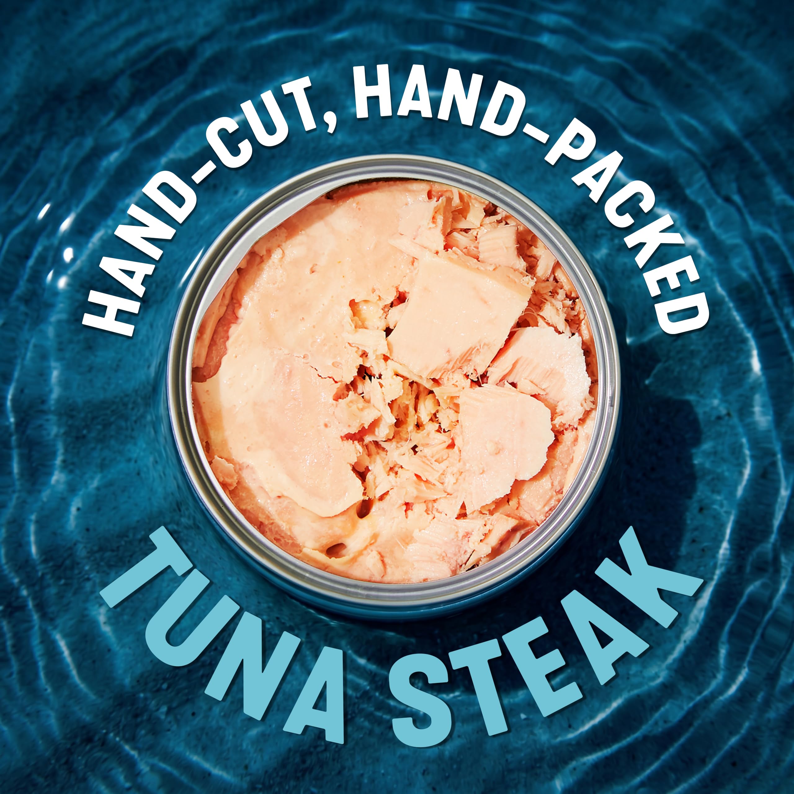 Wild Planet can held in hand showing 5 ounce size and portioning