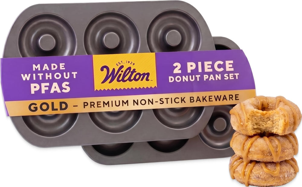 Wilton gold donut pan front view showing full cavities and clean finish for consistent baking