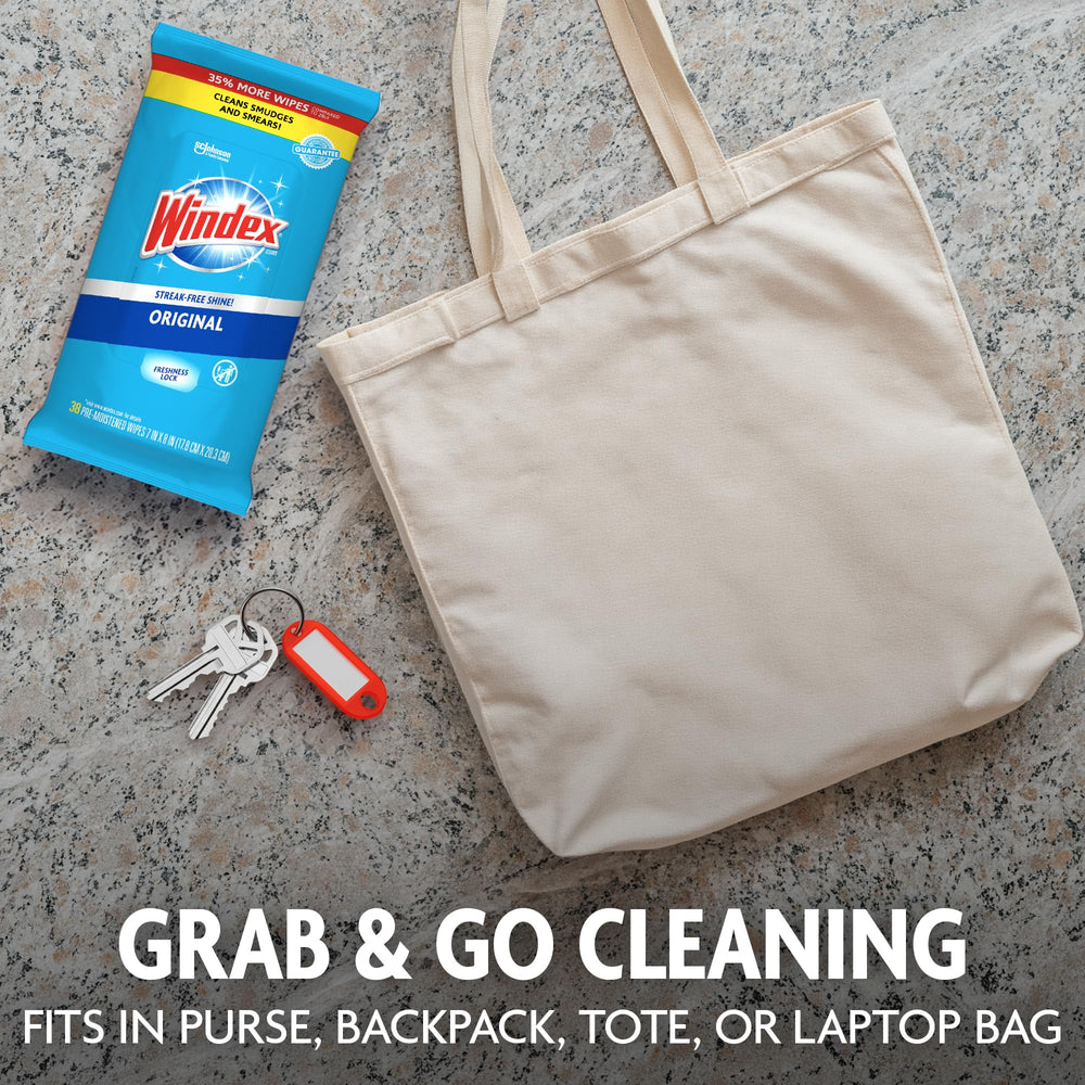 Resealable flat pouch being closed to preserve wipe moisture by Windex