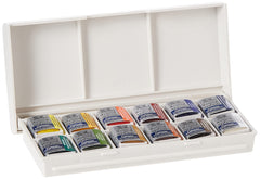 Winsor & Newton folded pocket brush beside case showing brush portability and precise strokes