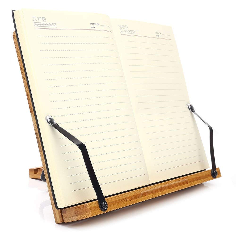 wishacc bamboo bookstand next to a notebook showing size comparison for portability benefit