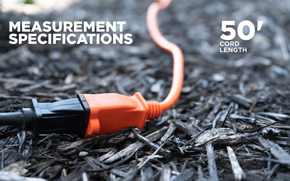 Woods cord lying in wet grass demonstrating moisture resistance benefit