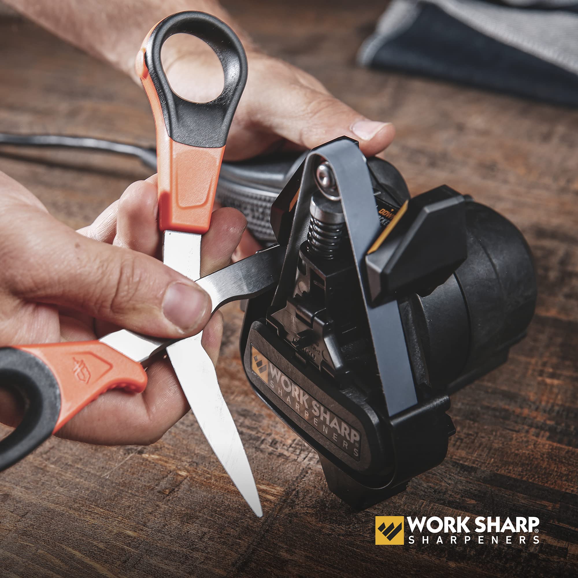 WORK SHARP MK2 grinding an axe head showing high-speed material removal for heavy tools
