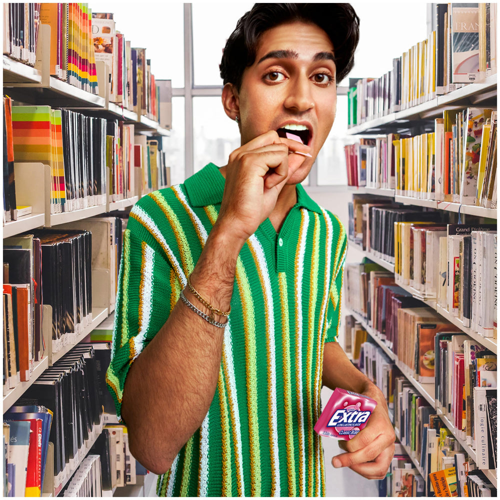 WRIGLEY'S EXTRA opened pack in hand ready to share and provide fast flavor