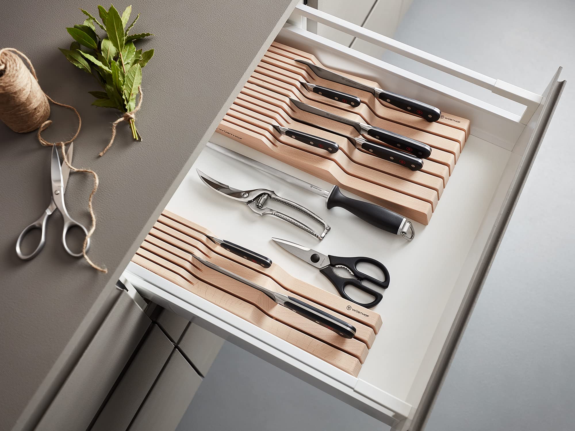 Wüsthof shears next to a chef knife for scale and countertop efficiency