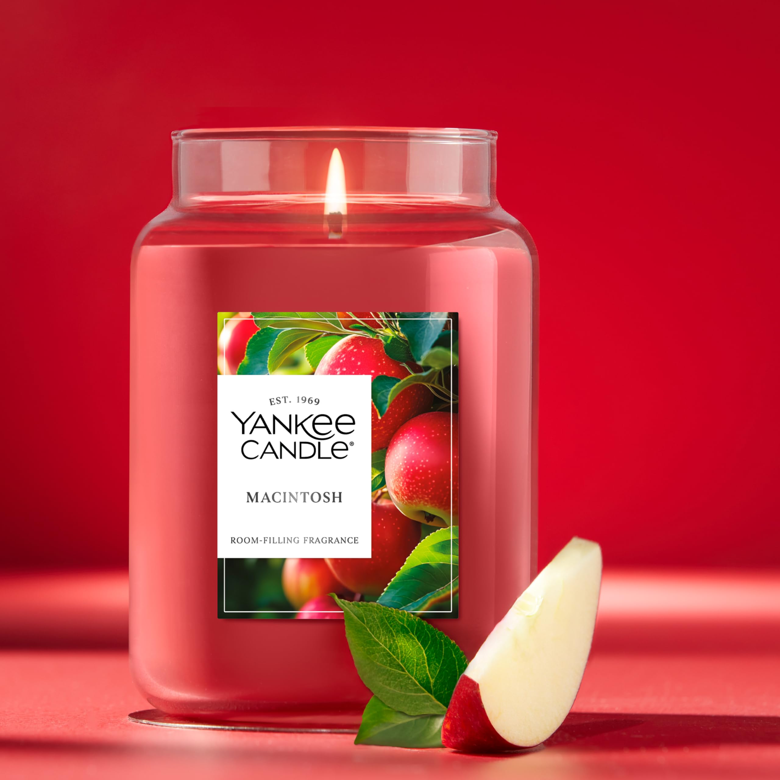 Yankee Candle Macintosh burning in living room adding cozy autumn aroma
