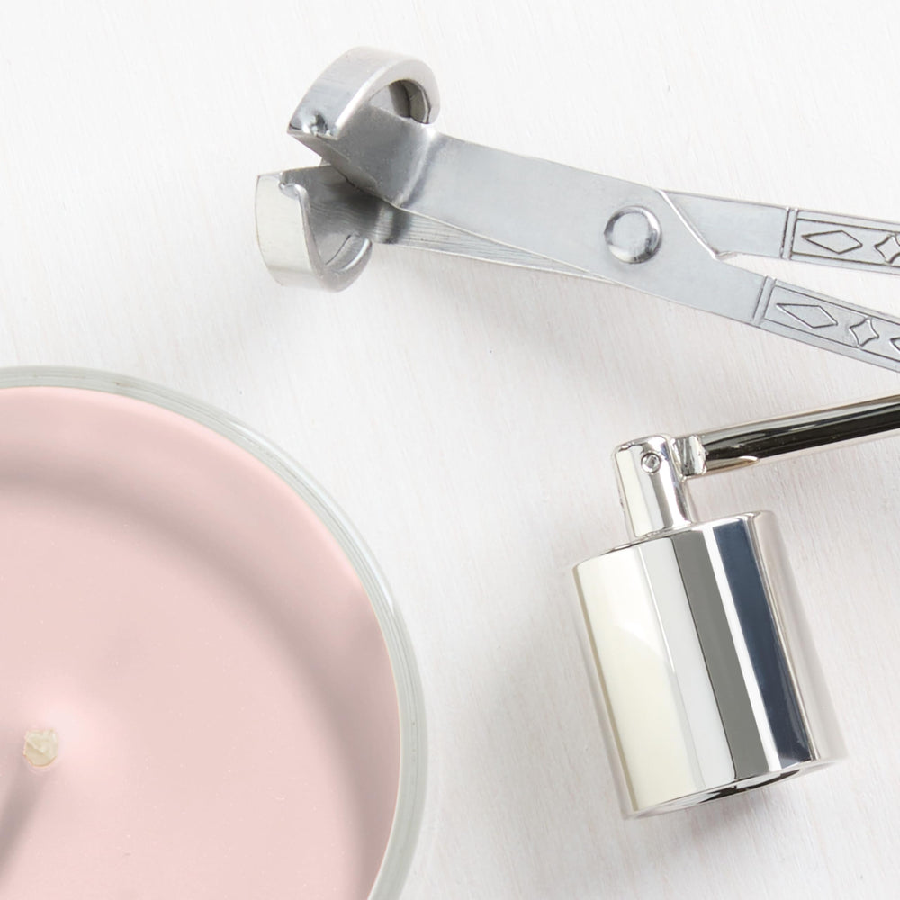 Yankee Candle Pink Sands size comparison next to a mug to show 22oz scale