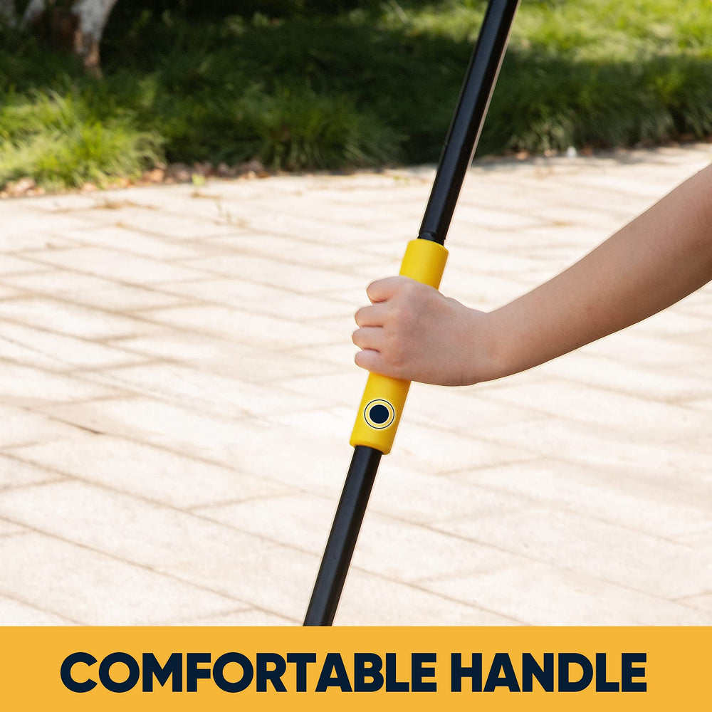 Yocada broom beside door illustrating full-length reach and posture benefit
