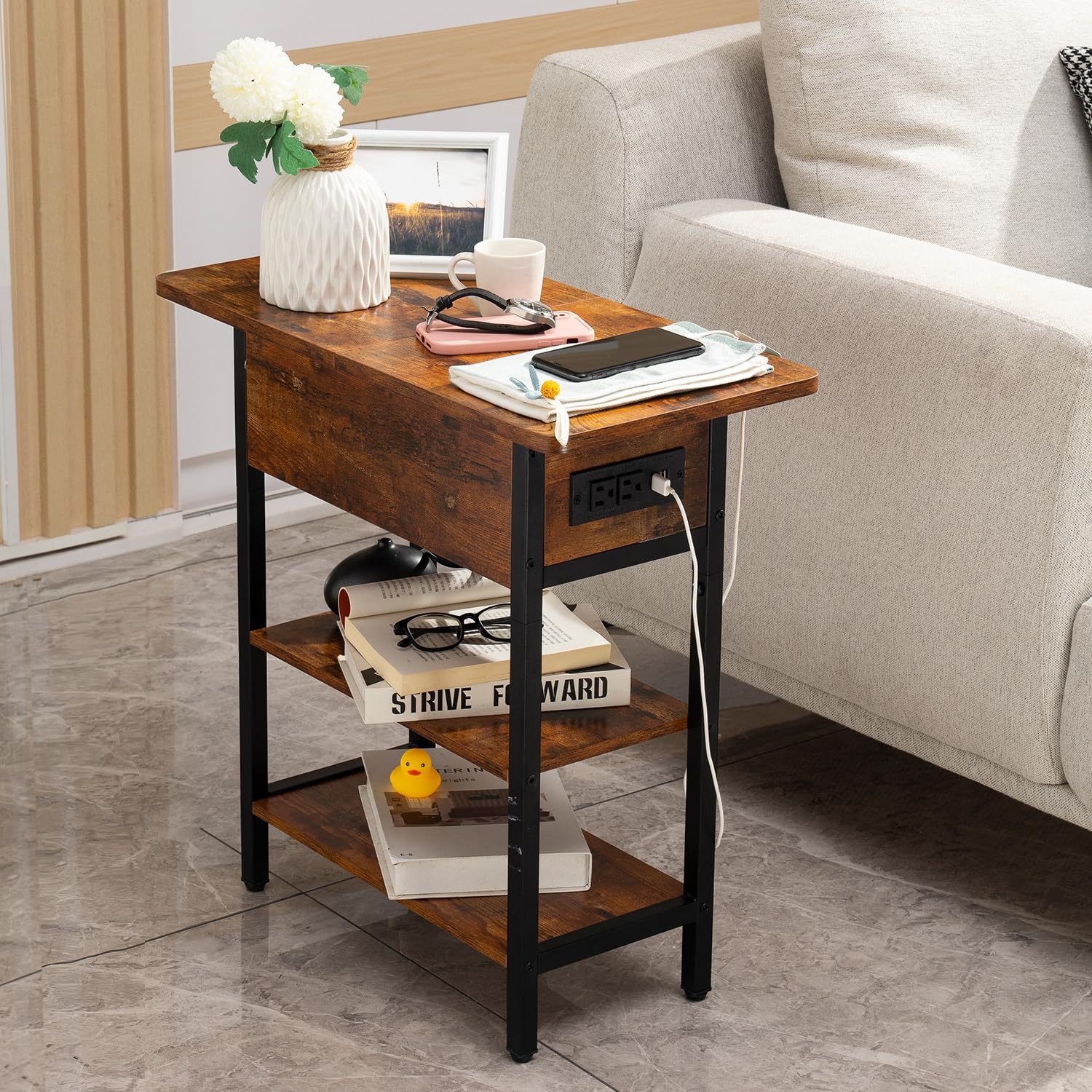 Yoobure scale next to sofa showing narrow footprint fits small spaces