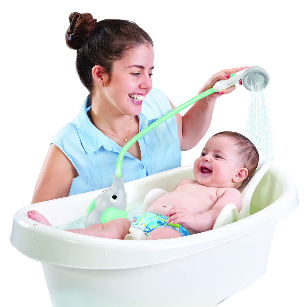 Yookidoo beside newborn in tub lifestyle scene illustrating calm bath time