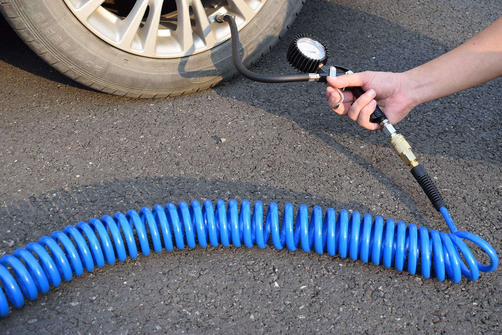 YOTOO hose in use in a garage demonstrating tool connection and workflow efficiency benefit