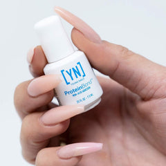 Young Nails product dispense close-up showing liquid texture and control