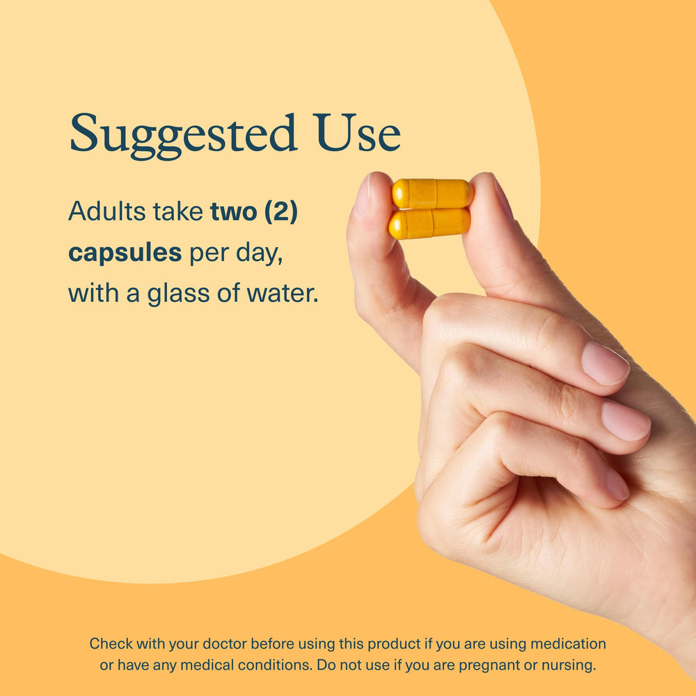 Youtheory capsules in hand demonstrating easy-to-take vegetarian form