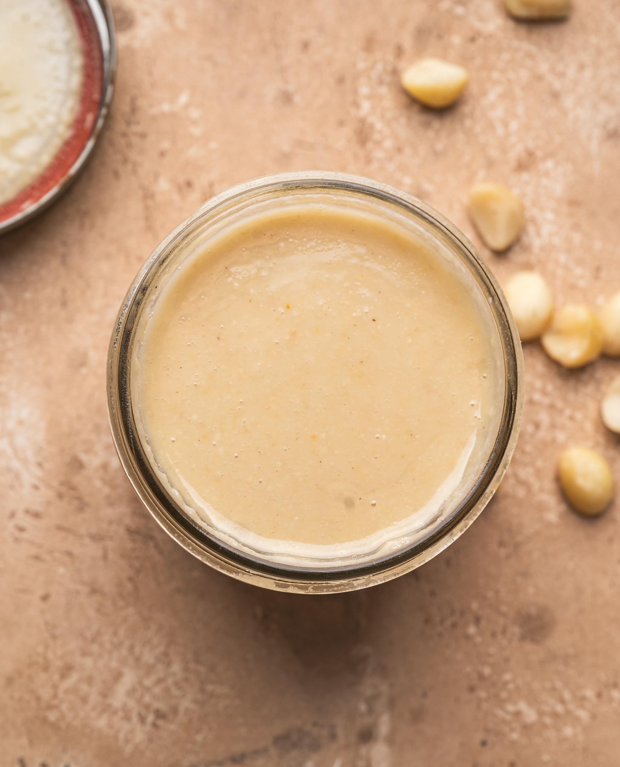 Yupik measuring cup portioning macadamia pieces for baking convenience
