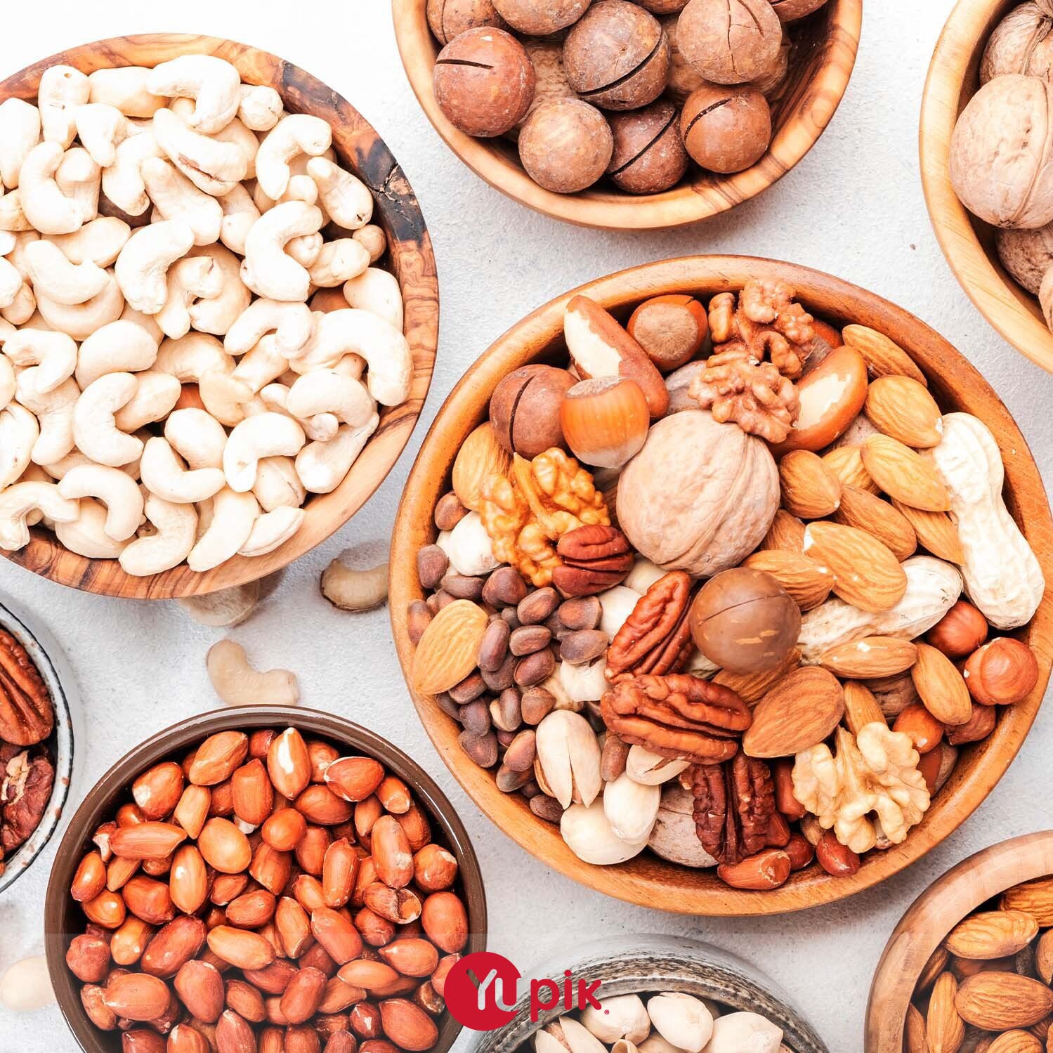 Yupik opened bag displaying plump nuts to show freshness and value