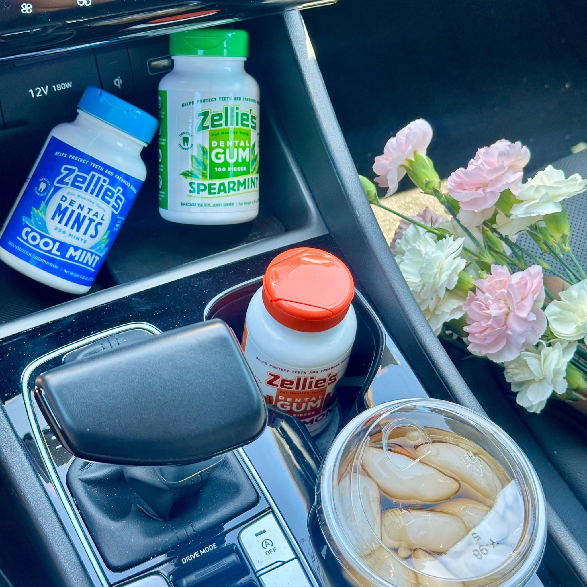 Hand holding Zellie's gum on the go for fresh breath anywhere