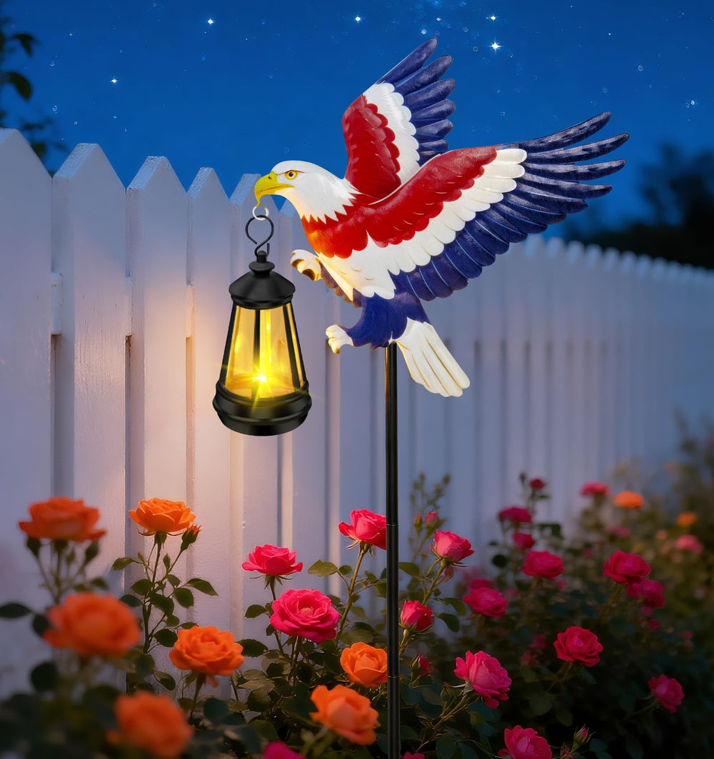ZFNN patio night glow with multiple stakes lit creating welcoming evening atmosphere