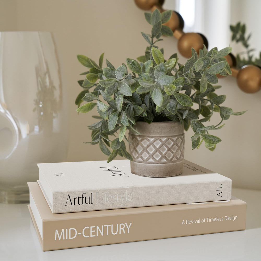 ZICOTO stacked on a coffee table with decor to add height and curated styling benefit