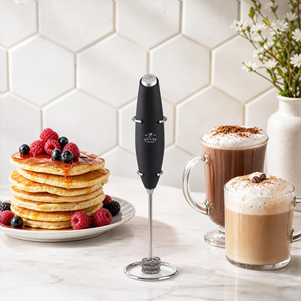 Zulay Kitchen frother resting on metal stand on counter for organized storage benefit